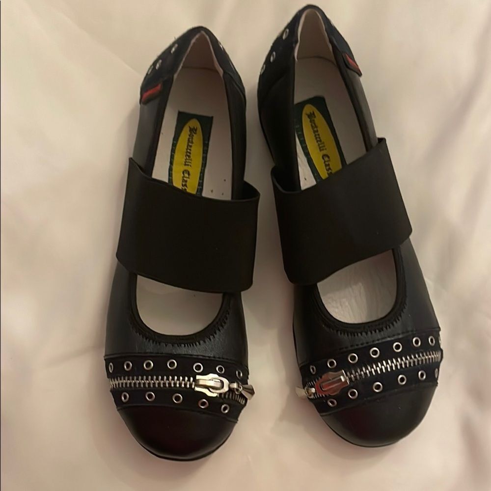BOUTACCELLI CLASSICS black zippered front, stud design w/studs also on back heel